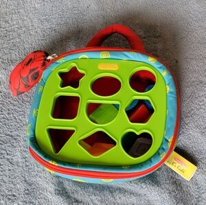 Melissa & Doug K's Kids Take Along Shape Sorter, 2 Sided Activity Bag, 9 Shapes